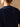 Close-up of the Midnight Navy Donegal sweater’s back neckline, showing delicate color flecks in the cashmere knit.