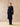 Full-length front view of the Midnight Navy Classic Cashmere Wrap Coat, tied at the waist over dark denim and brown pointed boots.