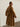 Three-quarter back view of the Classic Cashmere Wrap Coat in Warm Camel, showing the self-tie belt and wide sleeves.