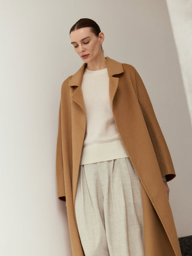 Closer front view of the Classic Cashmere Wrap Coat in Warm Camel, showing the notched lapels and open front over an ivory sweater.