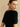 Close three-quarter back view of the Midnight Noir cashmere sweater, showing its brushed texture and jeweled neckline.