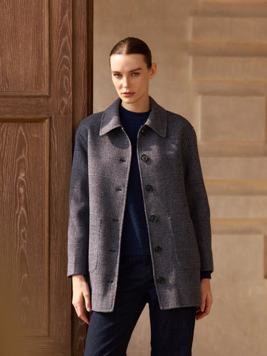 Front view of the Reversible Cashmere Car Coat worn with the Midnight Checker side facing out, showing the point collar and button front.