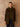 Front view of the Reversible Cashmere Car Coat worn on the Soft Sage side, showing the point collar and button front over dark denim.