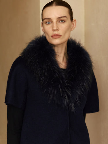 Closer front view of the Midnight Navy short-sleeve cashmere jacket, showing the full fur collar framing the neckline.