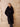 Front view of the Deep Navy Signature Cashmere Wrap Coat with fur collar and self-tie belt, worn over dark denim.