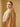 Close three-quarter view of the Warm Camel Signature Cashmere Wrap Coat, showing the full fur collar framing the neckline.