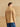 Closer back view of the Warm Sand Western Fringe Cashmere Jacket, showing twisted fringe across the back yoke and along the sleeves.