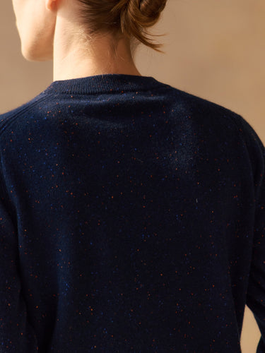 Close-up of the Midnight Navy Donegal sweater’s back neckline, showing delicate color flecks in the cashmere knit.