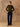 Full-length front view of the Olive cashmere crewneck sweater, styled with dark wide-leg denim and brown boots.