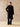 Full-length front view of the Classic Cashmere Wrap Coat in Jet Black, belted over dark denim with brown boots.