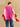 Back view of the Rose Multi cashmere topper, showing tonal buttons down the bright pink center panel and pale pink and red side panels.