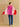 Full-length back view of the Rose Multi cashmere topper held open to show its generous width, three-color design and button closure.