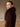 Close side view of the Chocolate Brown long cashmere coat, showing the full fur collar and shoulder.