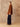 Full-length side view of the Reversible Cashmere Car Coat worn on the Camel side, showing its hip-covering cut and front patch pocket.