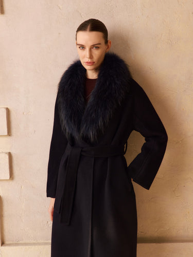 Closer front view of the Deep Navy Signature Cashmere Wrap Coat, showing the full fur collar, tied belt and long sleeves.