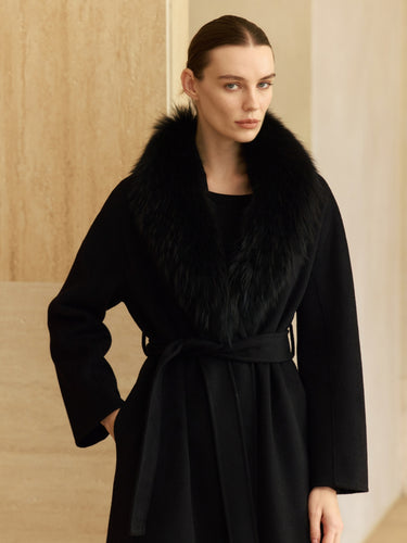 Closer front view of the Jet Black Signature Cashmere Wrap Coat, showing the fur collar, self-tie belt and long sleeves.