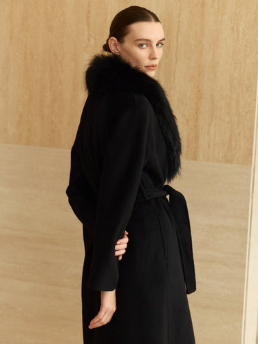Three-quarter back view of the Jet Black Signature Cashmere Wrap Coat, showing the fur collar and belted waist.